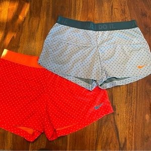 Orange and Teal NIKE athletic/running/tennis shorts. Size: L.